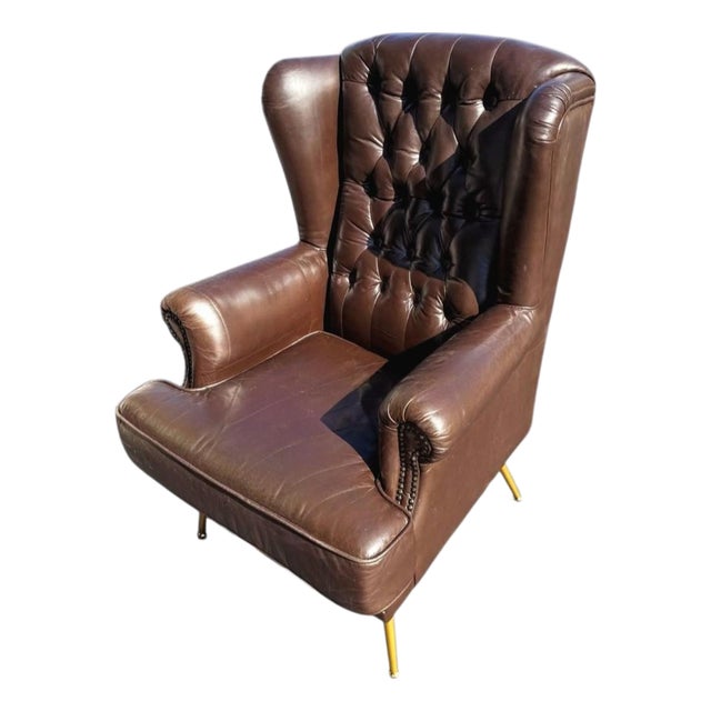 The Epitome of Mid-Century Prestige: Rare Vintage Rubelli Leather Wingback Chair For Sale