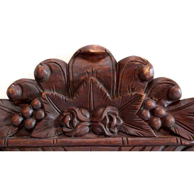 The most beautiful wood patina is the main feature of this carving. It is late classical/early Victorian style carved...