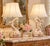 A wonderfully decorative pair of mid-20th-century Italian porcelain table lamps designed in the form of classical harps....