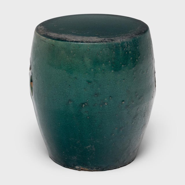 This small ceramic stool from the early 20th century follows the classic drum-form shape of traditional Chinese garden...