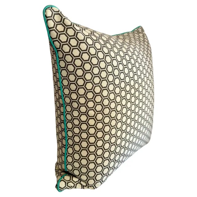 Infused with crisp geometric elegance, this 24‑inch decorative pillow features a refined honeycomb hexagon pattern framed...