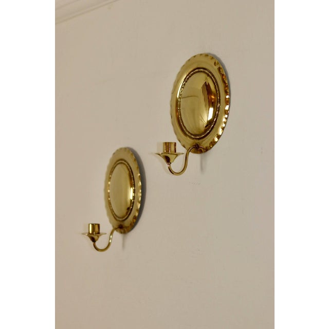 Made and Sourced from Sweden An amazing pair of Mid century brass wall sconces Both sconces are in good condition with...