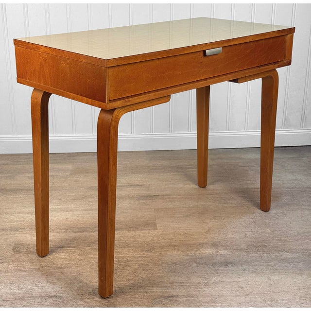 This Thonet Desk pairs nicely with many Mid-Century inspired interiors. The rectangle laminated top offers a spacious...