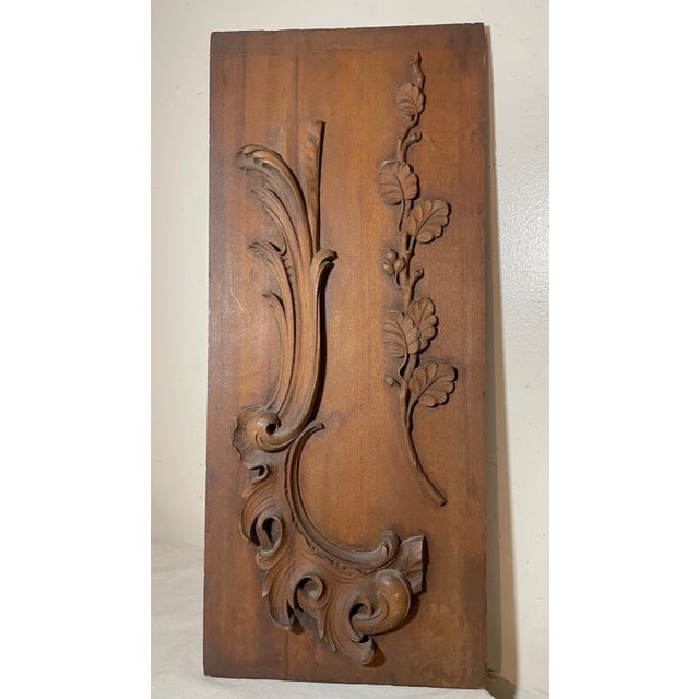 Created with undeniable expertise, this antique hand carved wood relief sculptural panel is a true testament to the skill...