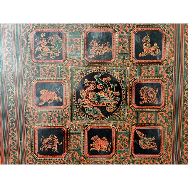 Very fine red and black antique square lacquer tray. Made in Burma in the early 20th century. Small paper label attached...