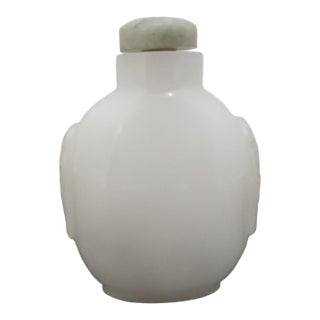 Chinese Carved Masks White Peking Glass Snuff Bottle With Green Top For Sale