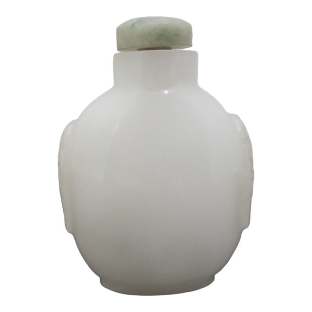 Chinese Carved Masks White Peking Glass Snuff Bottle With Green Top For Sale