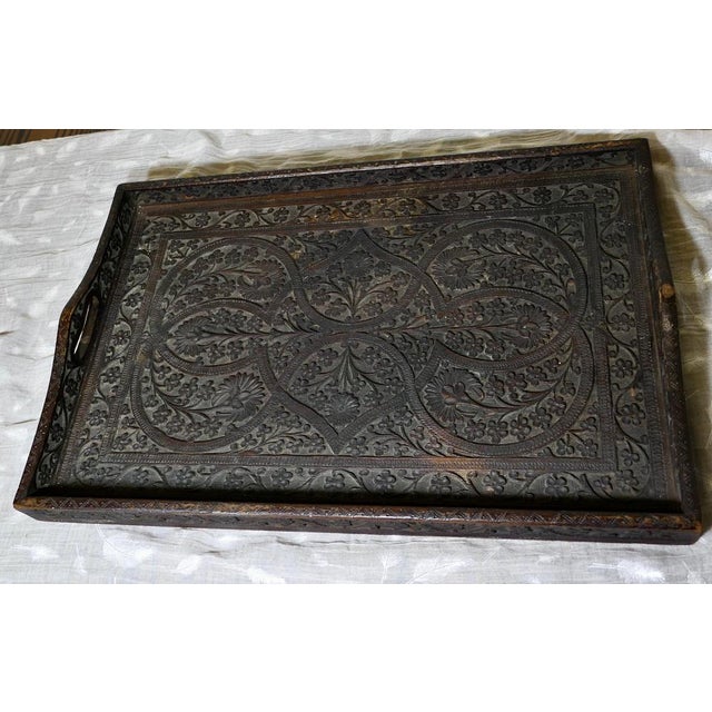 Oriental Folk Art Carved Tray This is a skilfully hand carved piece, the base, the sides and the edges (which form the...