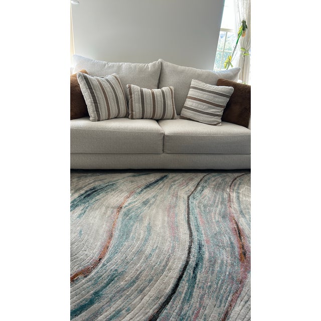 The Gabi fabric sofa offers an alluring comfort destination with sweeping lush curves. The oversized arms frame deep seat...