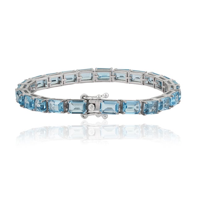 Art Deco Art Deco Style 26.1 Ct Emerald Cut Blue Topaz Line Tennis Bracelet in Sterling Silver For Sale - Image 3 of 12