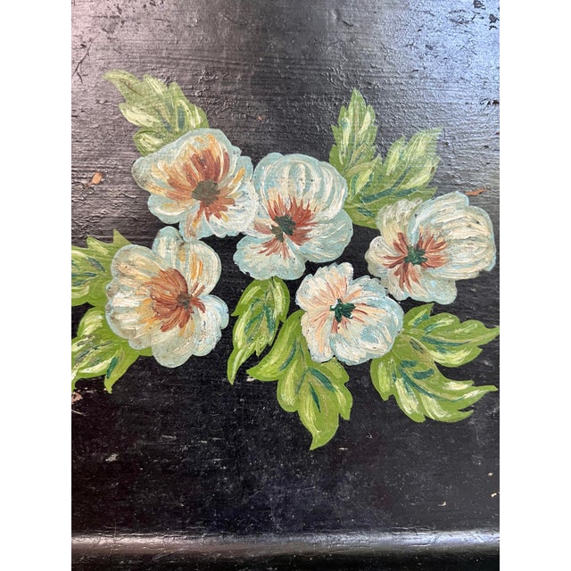 A charming paper mâché tray featuring hand-painted blue pansies. Perfect for styling on a coffee table, dresser, or shelf,...