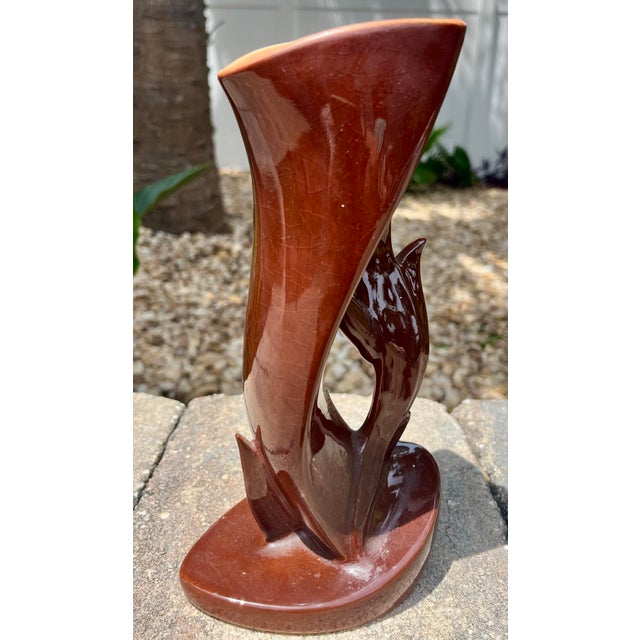 Mid-Century modern free form art pottery vase in a vintage brown glaze. Sleek and interesting design, great art deco style.