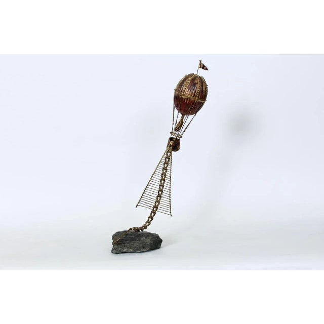 Brian Bijan attributed Hot Air Balloon Mixed Media Table Sculpture. Featuring a handcrafted, welded mixed metal sculpture...
