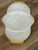 This vintage relish dish is made by Fire-King (Anchor Hocking) from white milk glass.It features three divided sections...