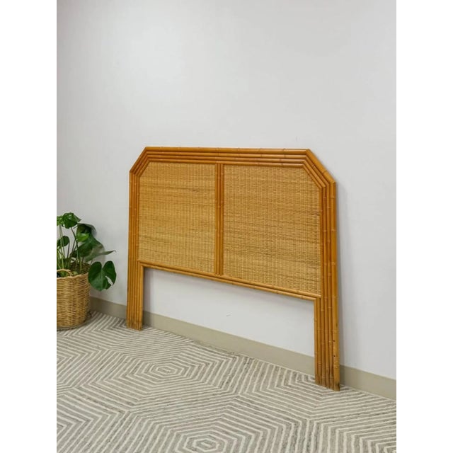 This gorgeous vintage bamboo and wicker queen headboard is a warm and beautifully crafted coastal and Hollywood Regency...