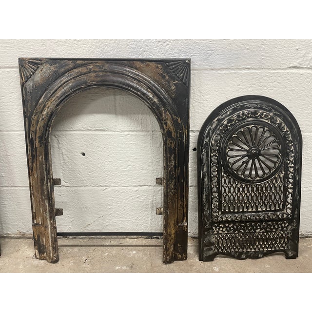 Beautiful design fireplace insert and surround with intricate fretwork. Add timeless charm to your home with this...