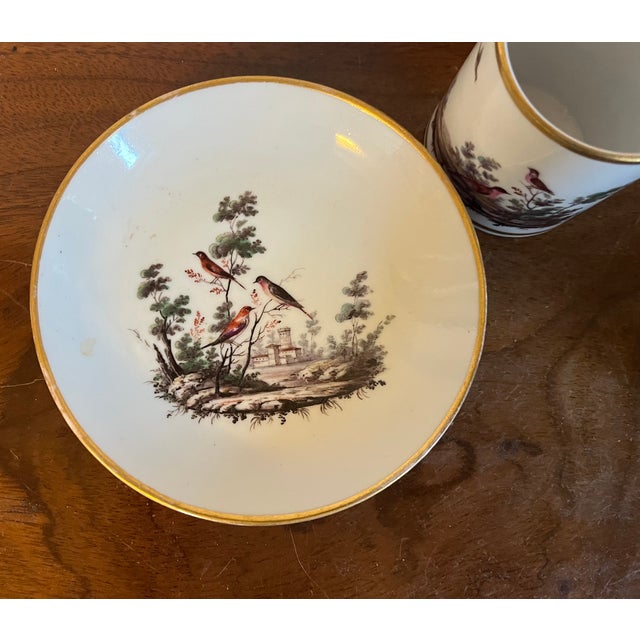 Antique 18th century Italian Doccia porcelain coffee cup and saucer, circa 1790. Decorated with birds in a landscape. Cup...