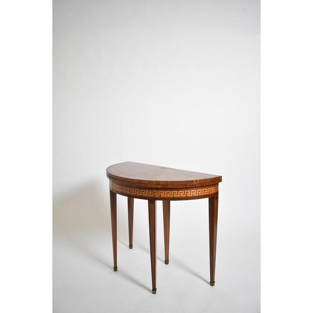 Half moon console table, XIXth c. Height: 75 cm - 29.53 in Length: 90 cm - 35.43 in Width: 45 cm - 17.72 in