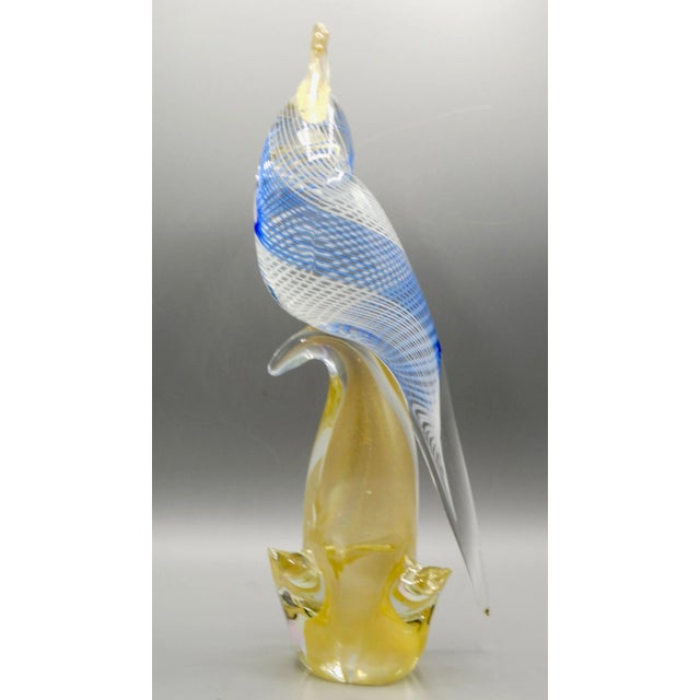 Mid Century Italian Murano Glass sculpture of a cockatoo bird. Hand blown in gorgeous colors of blue, gold and yellow....