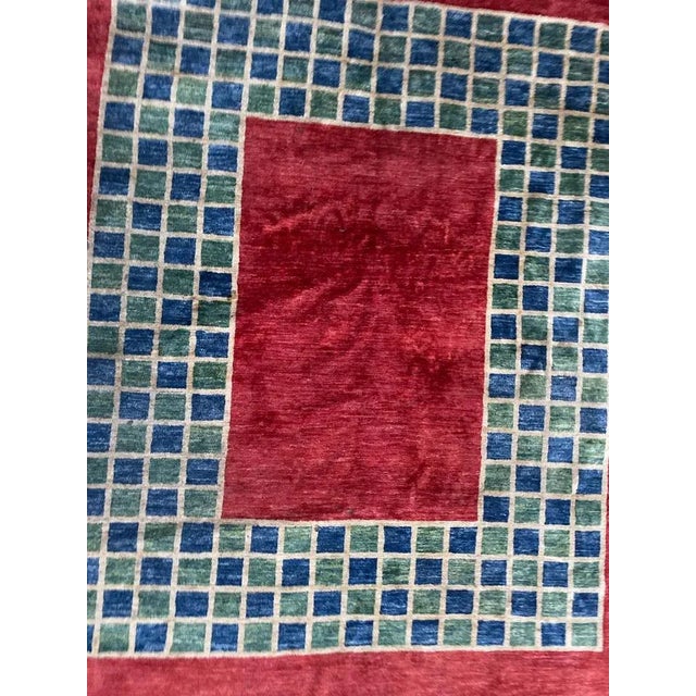 Very beautiful rug with nice modern design and beautiful colors with red, blue and green, entirely hand knotted with wool...