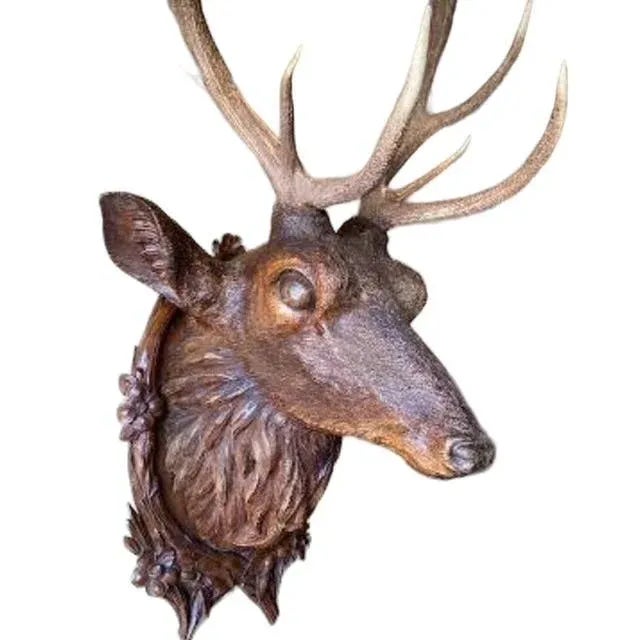 Beautiful large Black Forest Stag Sculpture. Hand carved with real antlers.