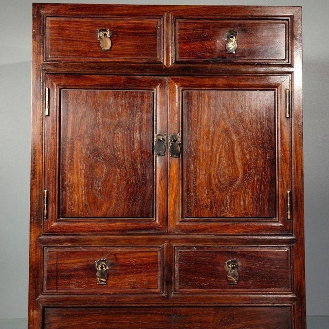 This is a magnificent vintage Chinese miniature cabinet, handcrafted from solid, highly figured Huanghuali (Rosewood)...