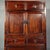 This is a magnificent vintage Chinese miniature cabinet, handcrafted from solid, highly figured Huanghuali (Rosewood)...