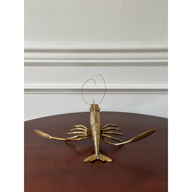 This vintage brass shrimp figure is certain to add a bit of whimsy to any space. While others have referred to this as a...