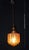 An evocative early 20th-century Art Nouveau pendant light, circa 1910, combining a dramatic hand-moulded, hand-blown glass...