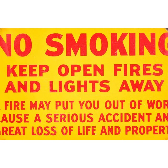 Antique fire danger sign -No Smoking- in yellow porcelain enamel.