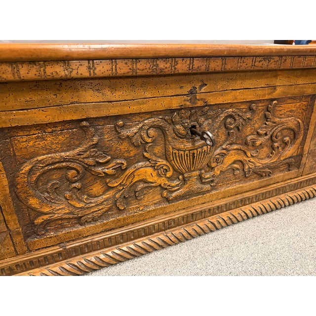 17th Century Country French Coffer / Trunk, crafted in solid cherry and showcasing exceptional period craftsmanship and...