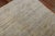Late 20th century part silk part wool Tibetan carpet in warm brown and gold hues. Measures: 11'9" x 14'10".