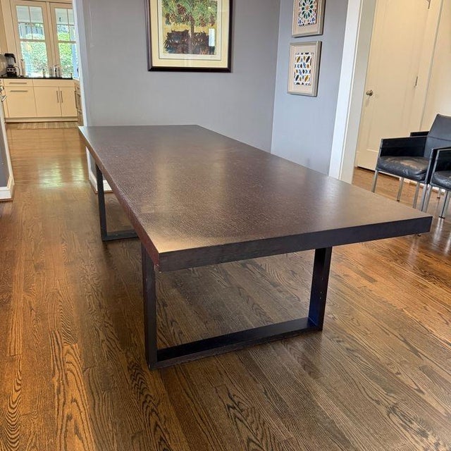 Casamilano Dining Table This table is simple in form with a solid top and open frame legs for an airy silhouette, making...