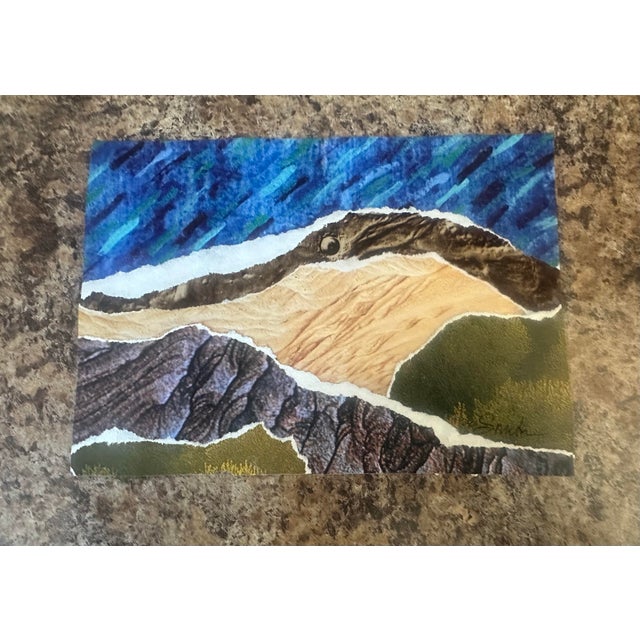 An abstracted landscape created with hand-torn papers and rich, earthy tones, this piece captures the natural rhythm of...