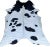 Beautiful natural Brazilian champagne and black cowhide with a particularly glossy coat. A monochromatic piece that works...