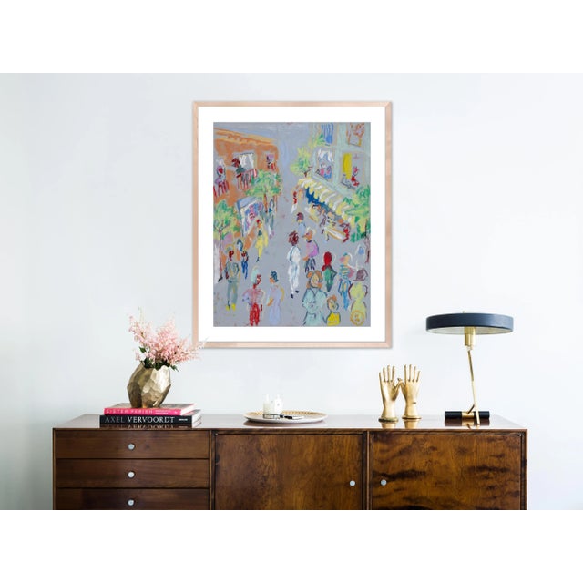 DESCRIPTION: In the Street by Happy Menocal in Natural Maple Frame, Small Art Print SPECIFICATIONS: Type: Framed Paper....
