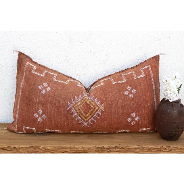 Woven from the resilient fibers of the Saharan aloe vera cactus — often called cactus silk or Sabra silk — this generously...