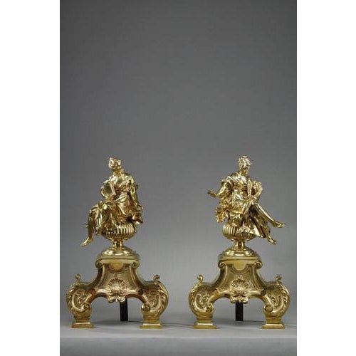 Pair of Louis XIV style ormolu and chased mantel lights decorated with muses seated on gadrooned balls, the base scrolled...