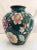Vintage Chinese embossed vase with hand painted peonies. Gorgeous vibrant peonies against a dark green / teal backdrop....