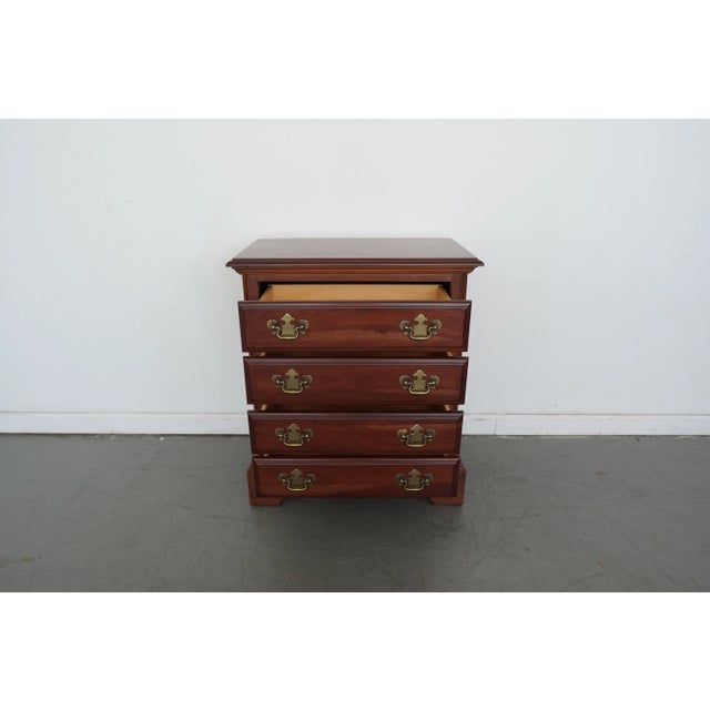 Crafted in 1986 by American Drew, this traditional mahogany 4-drawer nightstand is a timeless blend of function and style....