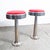 Pair of 1950s swivel diner barstools in red. The hardware to mount these is not included.