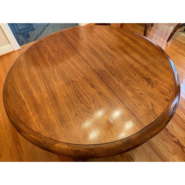 1970s Solid Oak Pedestal Dining Table With Two Leaves – Extends to 84” - Nashville For Sale - Image 4 of 6