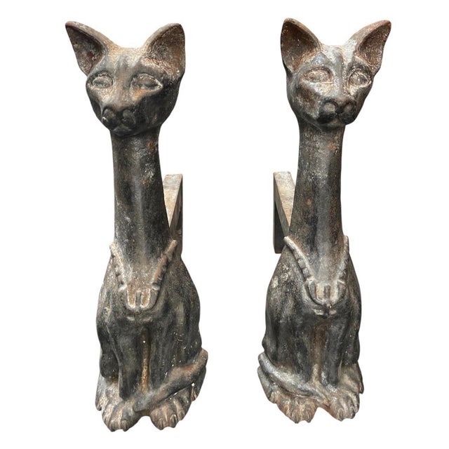 Add a touch of vintage sophistication and artistic flair to your hearth with this striking pair of mid-century stylized...