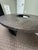 Retail for $7868. The Discus Cocktail Table expresses thoughtful modern design. A rolled bronze base softens its clean,...