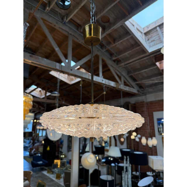 A refined Scandinavian pendant light designed by Carl Fagerlund for Orrefors and produced by Lyfa in Denmark during the...