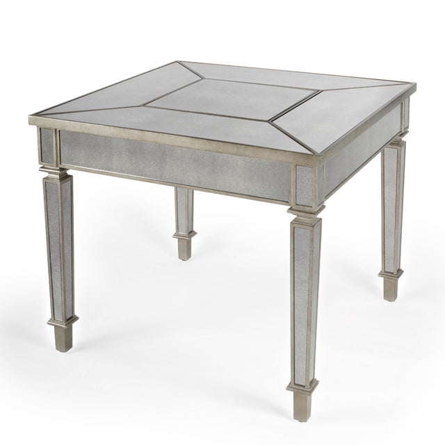 This stunning game table will add pizzazz to any living room, den, or home office. Accentuated by antique mirrored inlays...