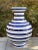Lovely navy blue striped porcelain vase measuring 15” tall. Versatile piece with contemporary flair to add to any style...