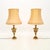 A stunning pair of antique neoclassical style brass table lamps. They were made in England, they date from around the...