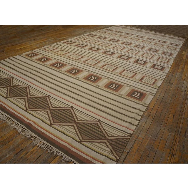 Antique Indian Dhurrie rug, size: 8'10" x 19'2". Dhurrie These are flat, tapestry woven cotton carpets from India in...