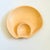 A vintage ceramic chip and dip tray in the shape of a seashell. Features a smaller inner bowl formed on one side. Ribbed...